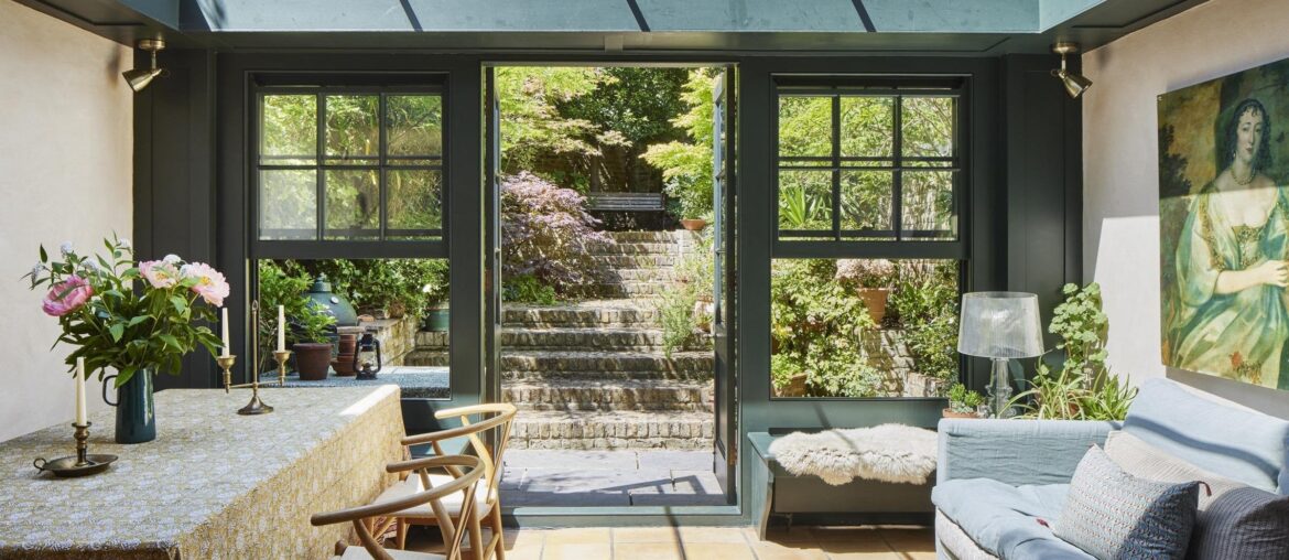 Garden room opening up to a tiered garden in a 1810s Georgian terraced house, Islington, London, UK [2400x1601]