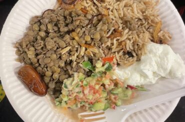 Lentils, rice with onions, salad, and yogurt