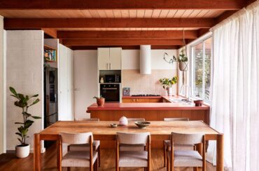 Kitchen with Kit Kat tile backsplash and original pink benchtops in a renovated 1980s house, Mount Martha, Melbourne, Victoria, Australia [6250x3515]