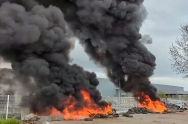 French Farmers Set Tires Ablaze in Front of Logistics Plant