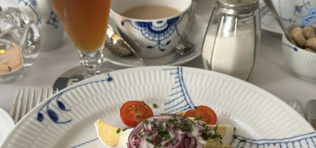Herring, curry sauce, boiled eggs, and onion in Copenhagen