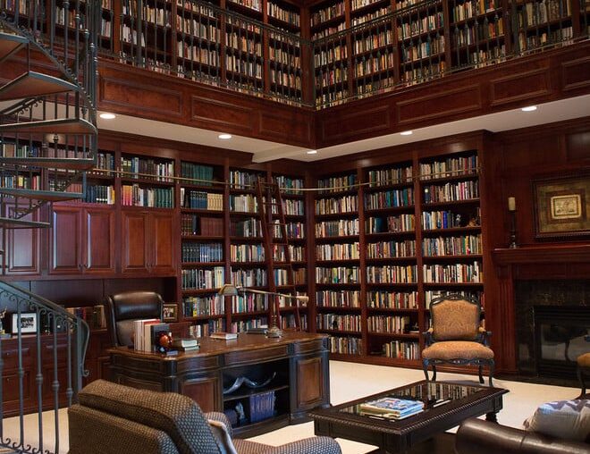 Double-height home office library with a fire place [660x990]
