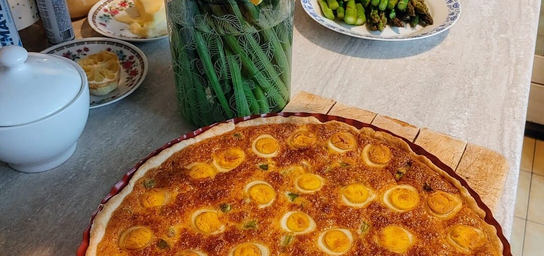 The tart with quail eggs my mom baked for our Easter Breakfast, plus my sister's pistachios cheesecake.