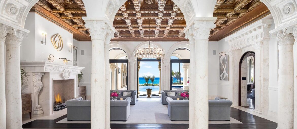 Grand Entrance in Delray Beach, FL Mega Mansion Leading to Living Room Adorned with Fireplace and Ocean Views [2398×1600]