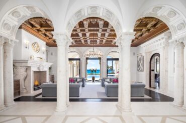 Grand Entrance in Delray Beach, FL Mega Mansion Leading to Living Room Adorned with Fireplace and Ocean Views [2398×1600]