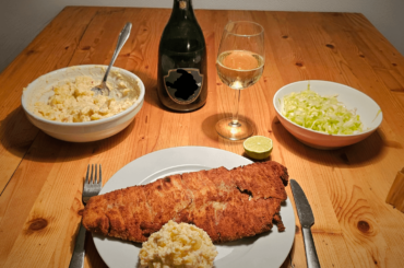 Baked Waldviertel organic carp fillet with homemade potato-mayonnaise salad and champagne.