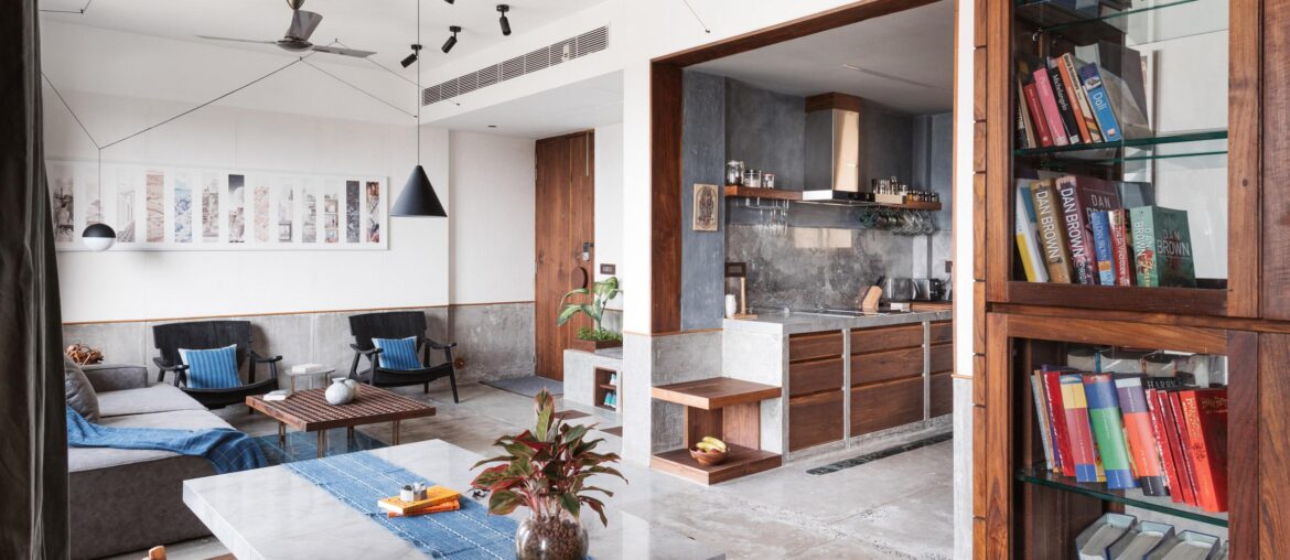 Polished concrete and teak wood complement each other in this studio apartment | Ahmedabad, India [2364 x 1749]