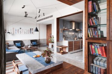 Polished concrete and teak wood complement each other in this studio apartment | Ahmedabad, India [2364 x 1749]