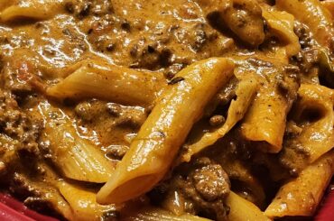 Penne with slow-cooked ragù (hashed beef with veggies)