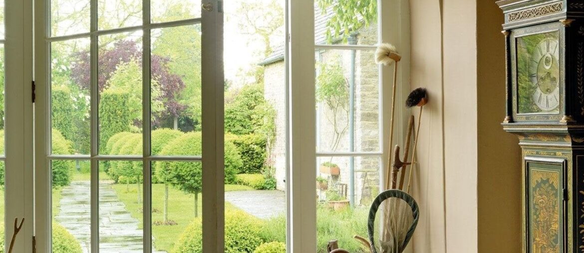 Entrance hall of a former stable converted into a country house, Oxfordshire, South East England [1280x1920]
