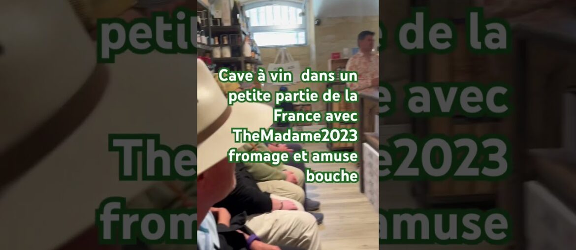 TheMadame2023 somewhere in France with her new friends and a glass of wine and cheese