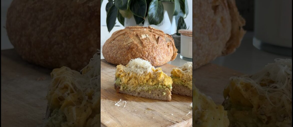 Soft scrambled eggs on sourdough with avocado and raw cheddar. #eggs #avocado #sourdough