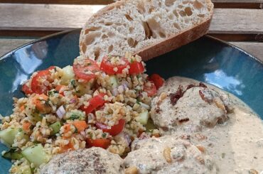 Oriental inspired meatballs in a yoghurt sauce, with a bulgur salad