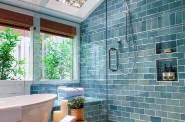 Blue-tiled shower with a skylight in a renovated bathroom, Hilton Head Island, Beaufort County, South Carolina [1440x1800]