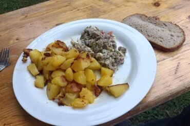 Feiersténgszalot, Luxembourgish beef salad served with sauteed potatoes.
