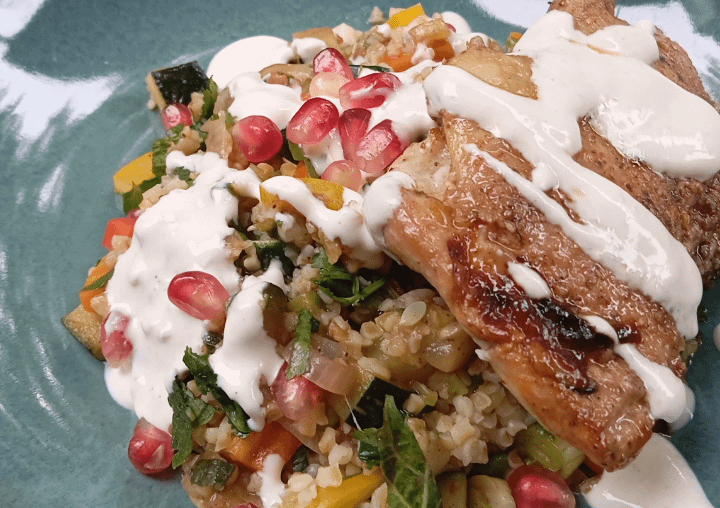 Bulgur with grilled and fresh veggies, chicken thigh, yoghurt-tahine sauce