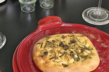 Focaccia made from leftover pizza dough (in addition to the obligatory rosemary, we also like to add a little sage)