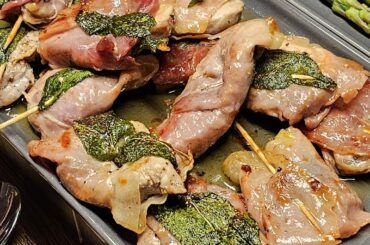 Saltimbocca with early potatoes roasted with thyme, rosemary and sage fresh from the garden, and green asparagus