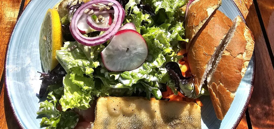 Zander, salad, bread and beer on the shores of Lake Constance, Germany