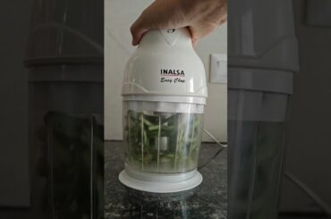 French beans on electric vegetable chopper
