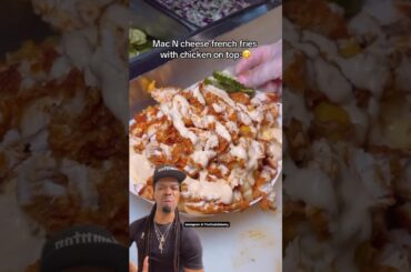 Mac N cheese french fries with chicken on top :