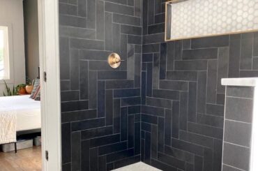 Bathroom with a black herringbone tiled shower, Nashville, Tennessee [1080x1350]