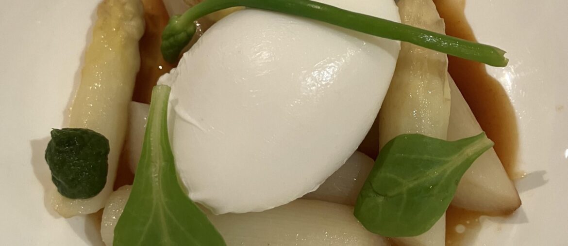 White asparagus with a poached egg