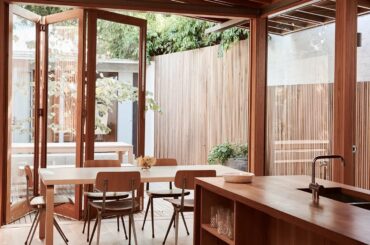 Timber joinery dining space with courtyard garden views, South Yarra, Melbourne, Victoria, Australia [1440x1858]