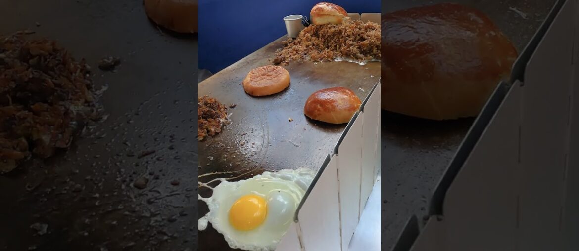 French-Style Burger of Duck Meat. London Street Food French-Style Burger of Duck Meat. London Street Food