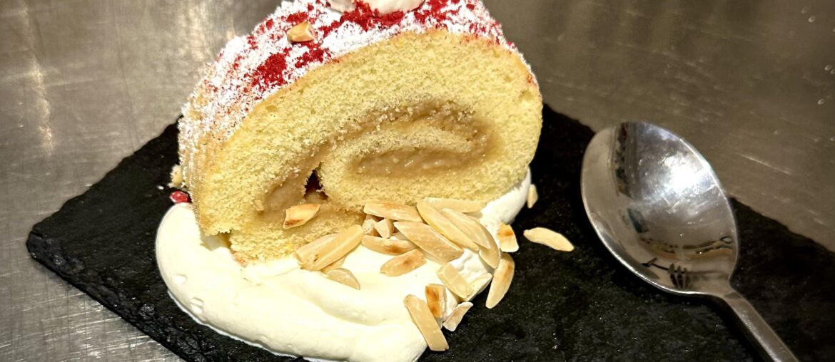 Banana Butter vanilla roulade with sweet whipped cream & toasted almonds