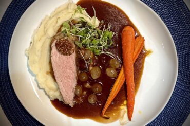 Pork tenderloin, whipped potatoes, red wine sauce with pearl onions & carrots glazed in maple syrup & lemon