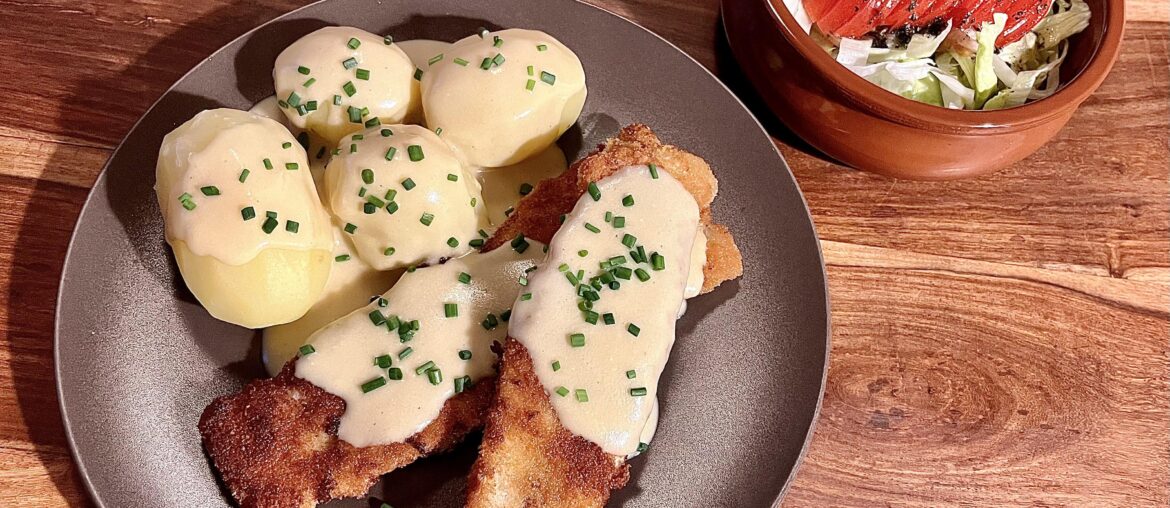 Breaded pollock fillet, potatoes and mustard sauce