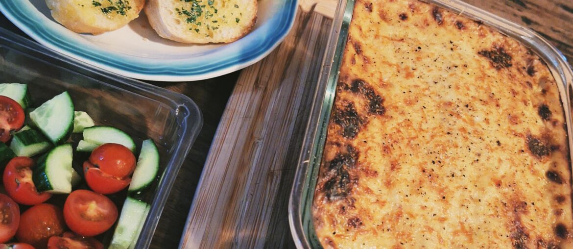 I was encouraged to post this here. Mousakka and Homemade Garlic Bread. YUM