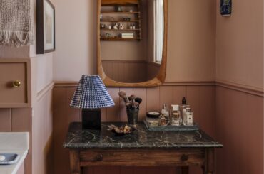 Bathroom with pink terrazzo floors in a renovated 1958 bungalow, Calgary, Alberta, Canada [2500x3828]