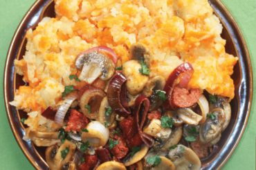 Carrot-mash with mushrooms and chorizo