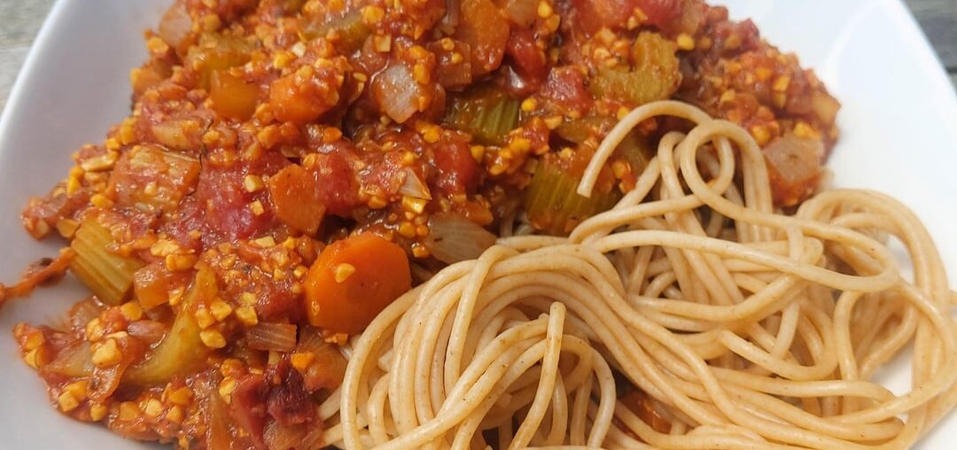 Whole grain apaghetti with lupin bolognese and a side salad.