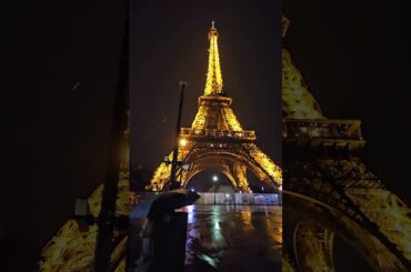 Up close with Eiffel Tower one rainy evening in #paris see it sparkle #travel #eiffeltower