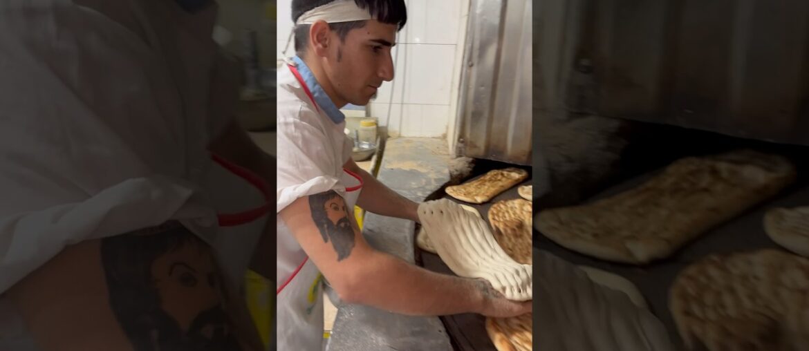 The art of martial arts in baking barbarian bread in Iran #shortsvideo #bread