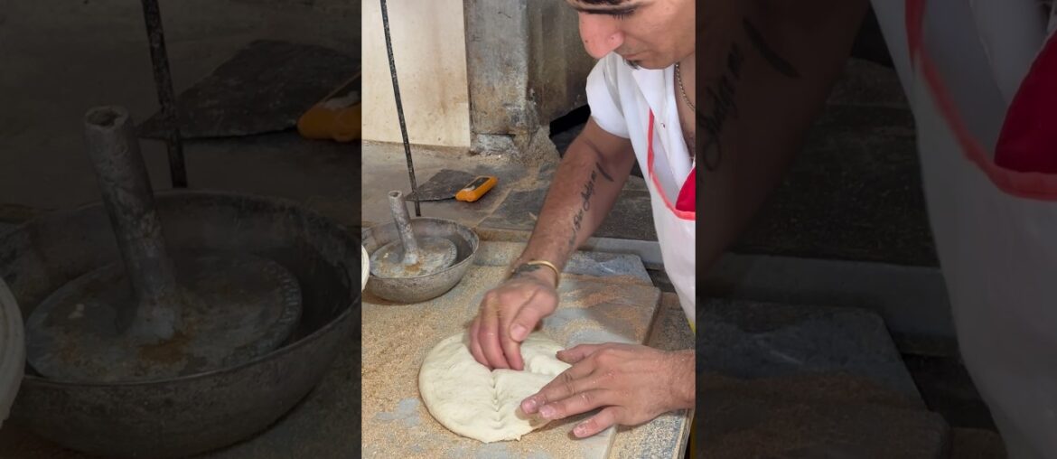Baking barbari pizza in a Berberi bakery in Iran #shortsvideo #bread