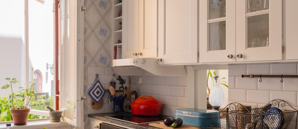 Compact kitchen with an arched window in an 1882 one-bedroom apartment with original details, Södermalm, Stockholm City Centre, Sweden [1800x2400]