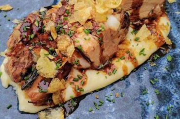 Pork Belly with apple cider gravy on mashed Potatoes