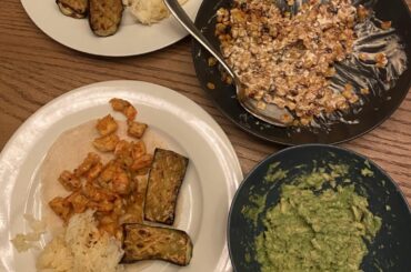 prawn tacos with saffron rice, chargrilled courgette, cabbage slaw, esquites (corn) & guacamole