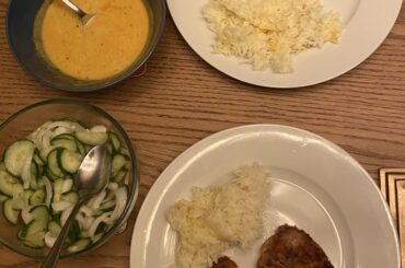 pork cutlet, saffron rice, japanese-inspired curry sauce, cucumber salad