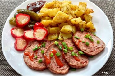 Roasted meatloaf with chili sauce, roasted potatoes with rosemary and garlic, peppers stuffed with cabbage and barbecue sauce.