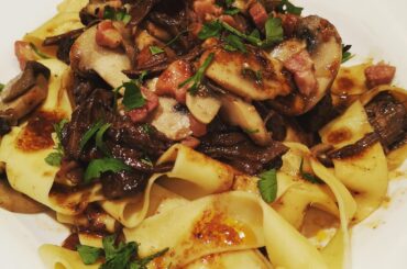 slow-cooked beef short ribs with mushroom and pancetta and red wine sauce