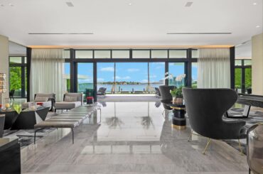 Living Room with Floor to Ceiling Windows and Large Sliding Doors in a Miami Beach, FL Home That Recently Sold for $45,000,000 [5000×3333]