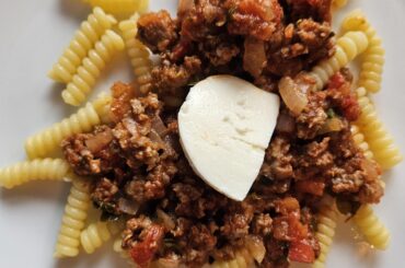 Pasta with a sauce made of veal mince, onions, garlic, homegrown basil and oregano, and homegrown tomatoes