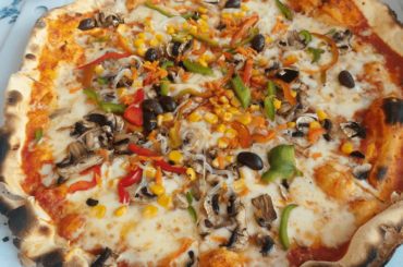 This is the best pizza in the world. It's giant but super thin, so usually a single serving.