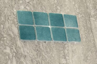 What would you paint the bathroom walls with this tile combo?