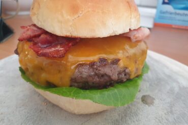Homemade Wagyu Bacon Cheeseburger with black truffle sauce